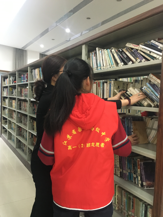 高一2班志愿者校图书馆图书整理 (2).png